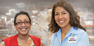 Two Women Costco Employees smiling